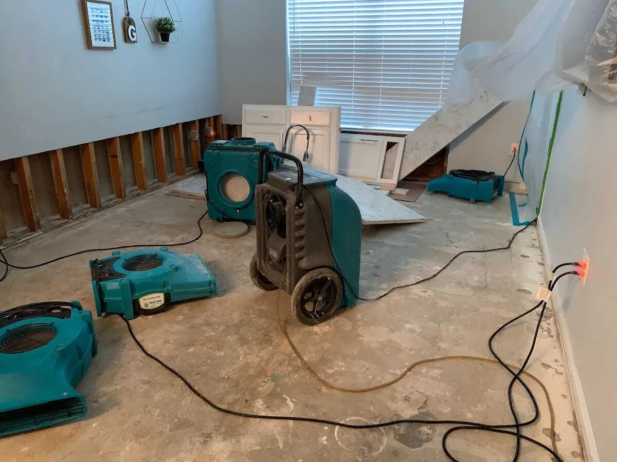 Dehumidifier in flood-cut room for Water Damage Restoration in Show Low